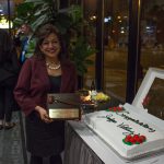 The Honorable Maria Valdez with her award and "everything" cake